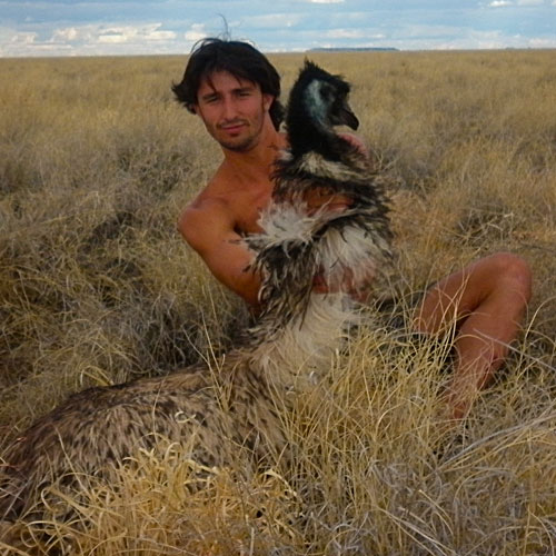 Andrew Ucles with an emu