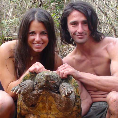 Andrew Ucles and Laura Zerra with a snapping turtle