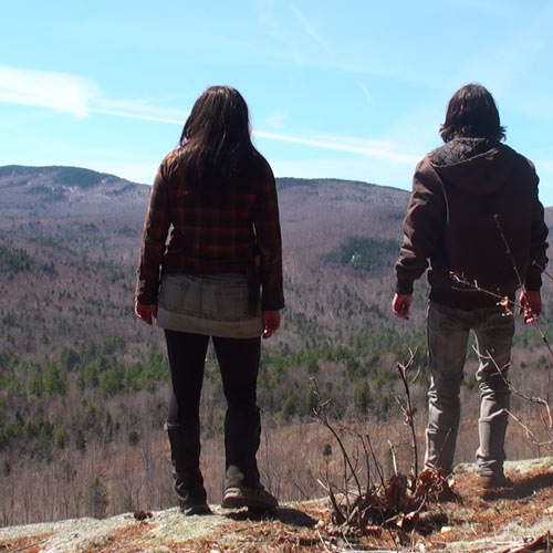 Andrew Ucles and Laura Zerra overlooking a cliff